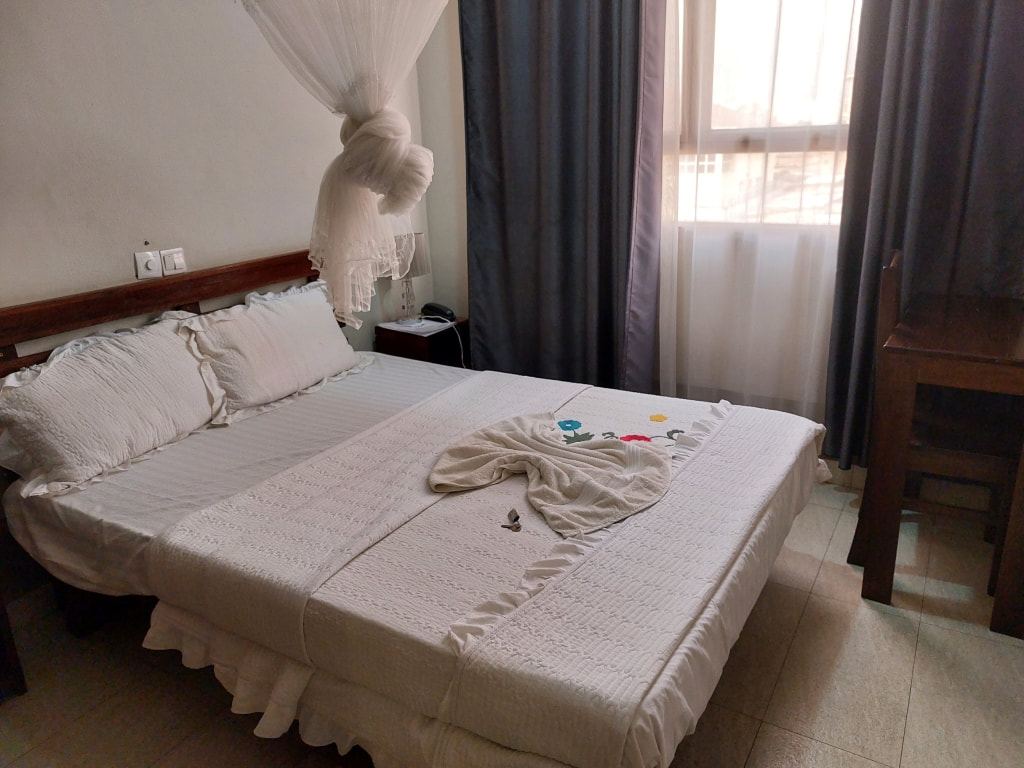 bed in the Camel Africa Hotel in Bujumbura Burundi