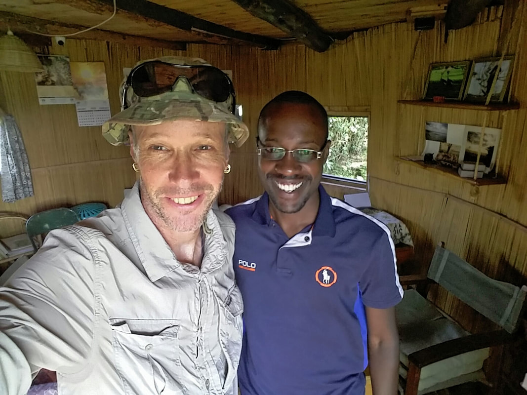 with staff at the Crescent Island Game Sanctuary Kenya