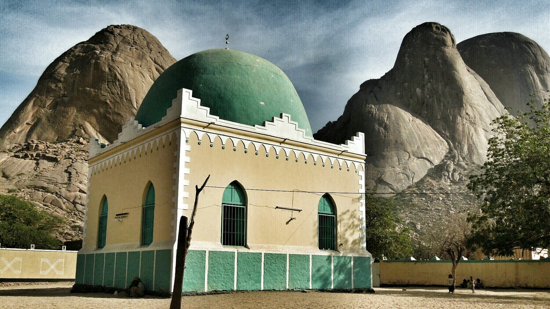 the Khatmiyya Mosque in Kassala, Sudan with the Taka Mountains as a backdrop