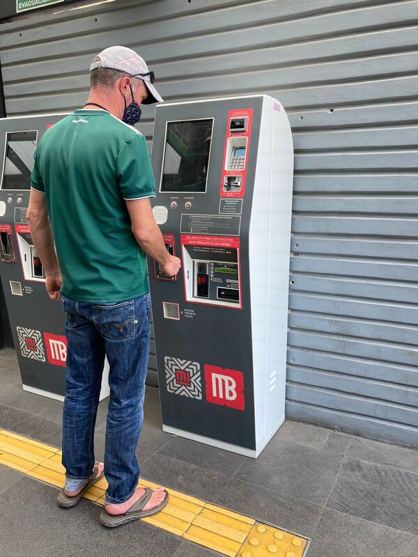 topping up my metro card at the MetroBus station in Mexico City
