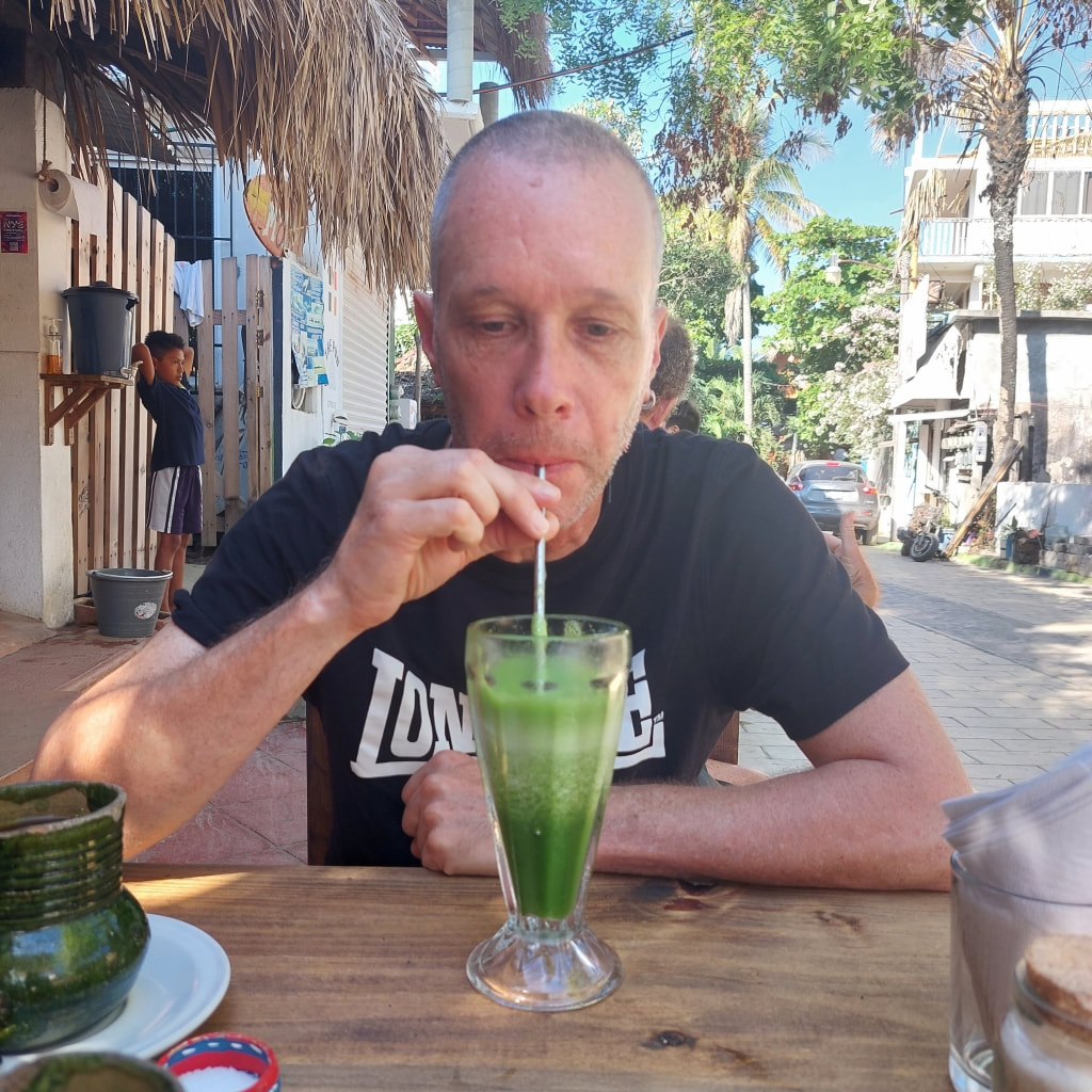 drinking Green Juice at Kelly Ko in Zipolite Mexico