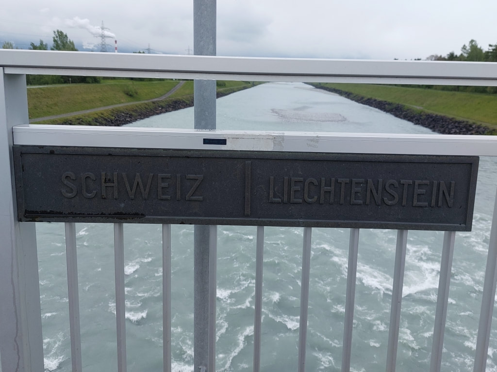 Schweiz Liechtenstein sign on the bridge across the river rhine