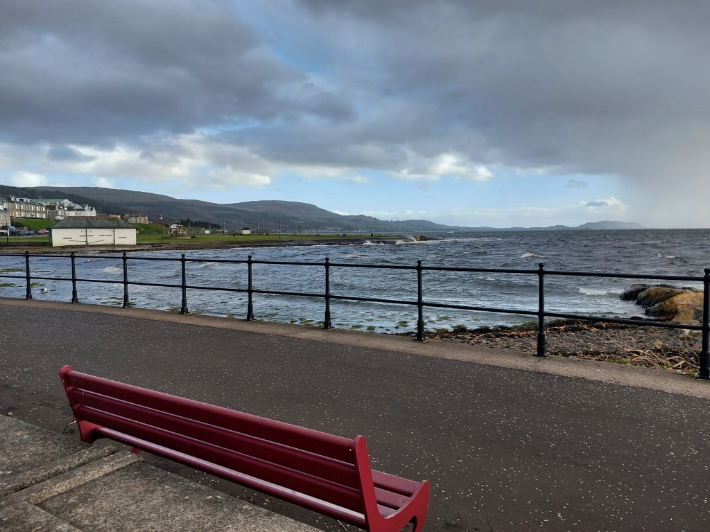 view from largs at the rain clouds