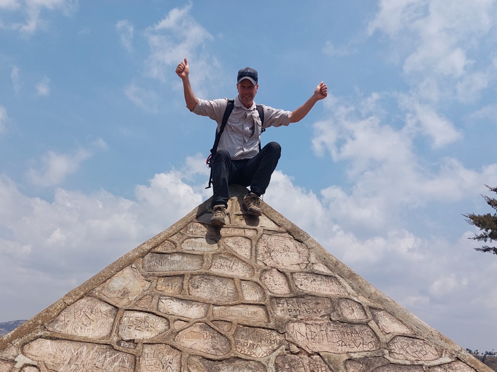 Nomadic Backpacker at the Source of the Nile Pyramid in Burundi