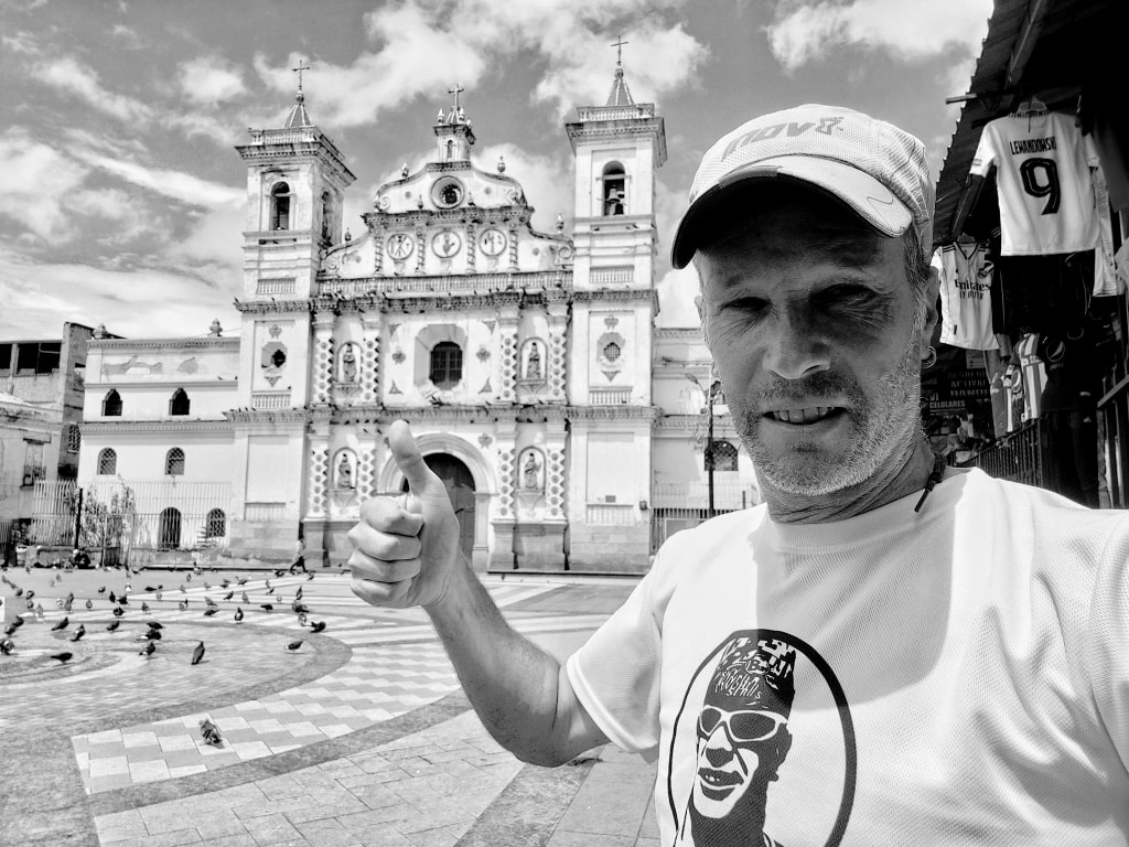 Standing in front of the cathedral in the main square in Tegucigalpa, Honduras