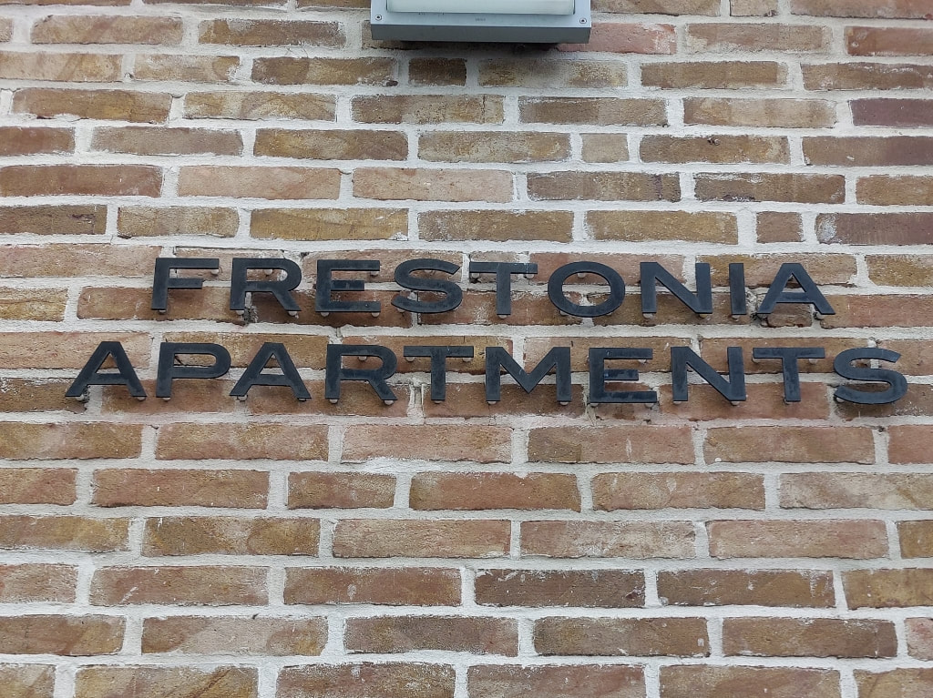 Frestonia Apartments sign
