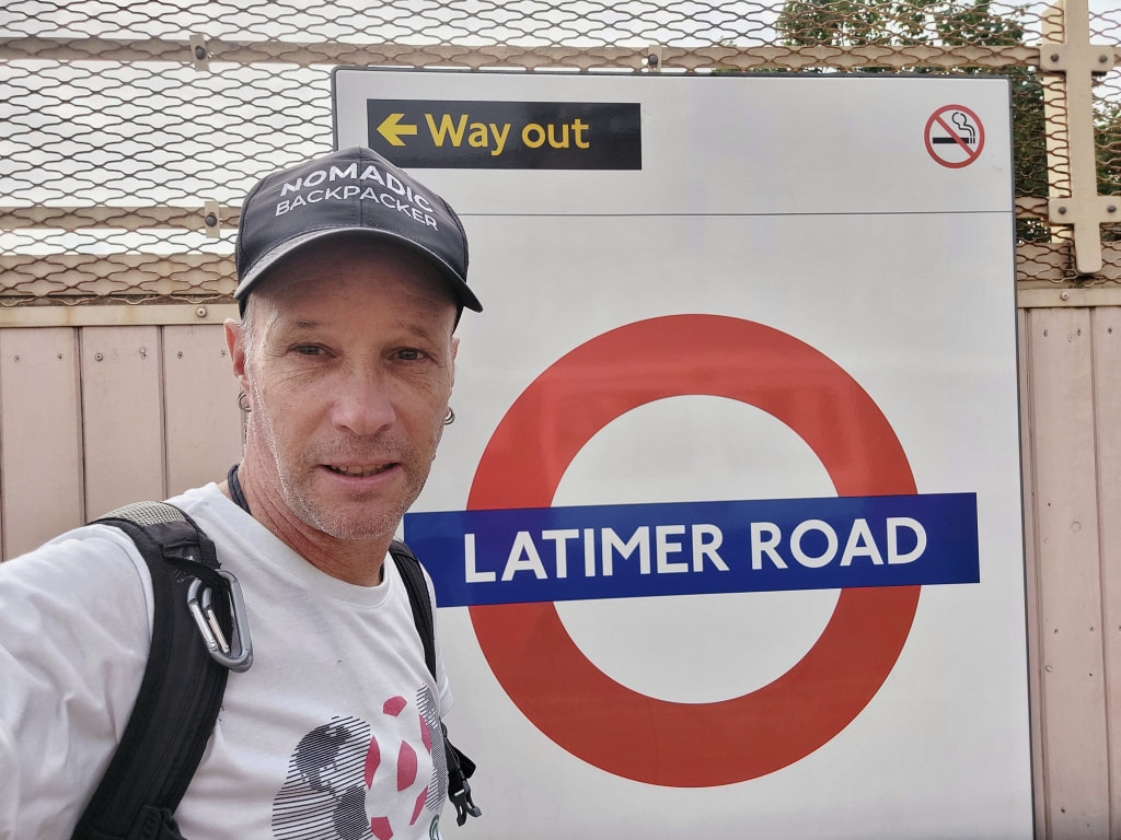 Nomadic Backpacker at the Latimer Road tube station