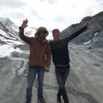 Pamir Highway: Hitchhiking Across Kyrgyzstan and Tajikistan Celebrating on the Ak Baital Pass in Tajikistan