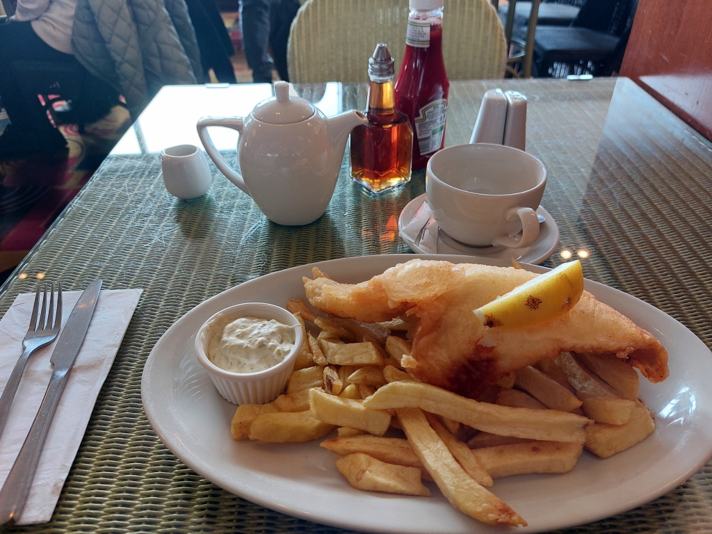 a plate of haddock and chips